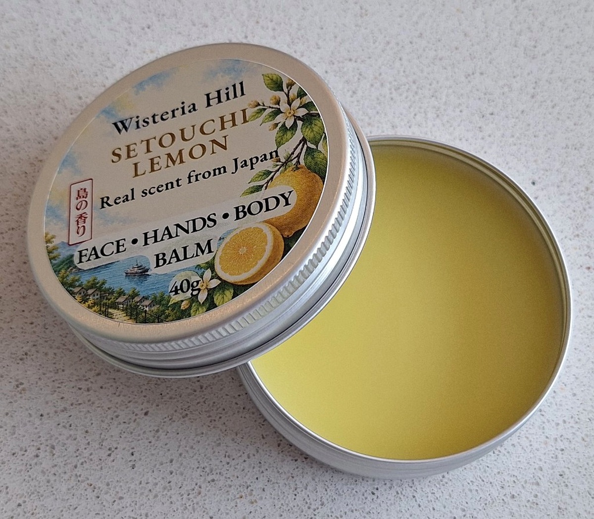 Open tin of Setouchi Lemon botanical balm